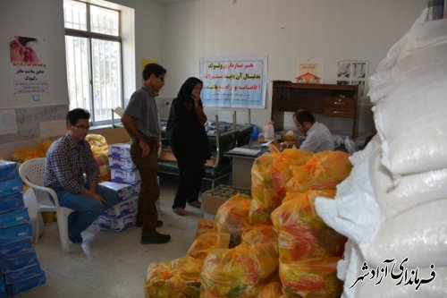 توزيع120بسته سبد غذايی بين مادران باردار آسيب پذير در شهرستان آزادشهر