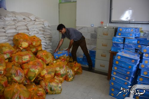 توزيع120بسته سبد غذايی بين مادران باردار آسيب پذير در شهرستان آزادشهر