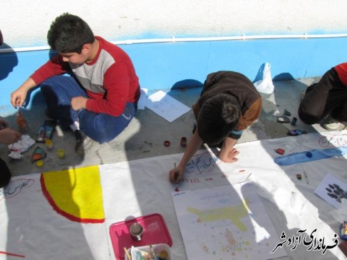 جشنواره نقاشی همگانی در دبستان شاهد آزادشهر