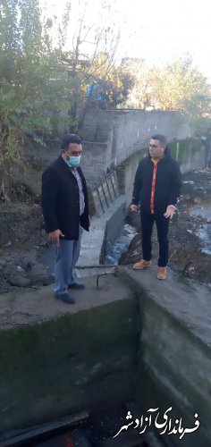 اجرای دیواره حفاظتی بتنی رودخانه شهیدخنجری جنب پل 20 متری شهید نوری توسط شهرداری آزادشهر 