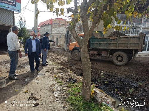 زیرسازی واجرای آسفالت انتهای کوچه فرهنگیان به طرف کمربندی با نظارت دکتر منصوری شهردار آزادشهر 