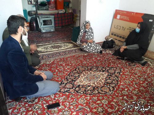 دیدار سرپرست بخشداری مرکزی آزادشهر با خانواده شهدا در روستای تیلان