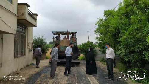 جرای پروژه زیرسازی و آسفالت معابر روستای قورچای بخش مرکزی آزادشهر