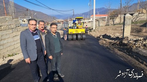  اجراي پروژه آسفالت مشارکتی روستای وطن انجام شد